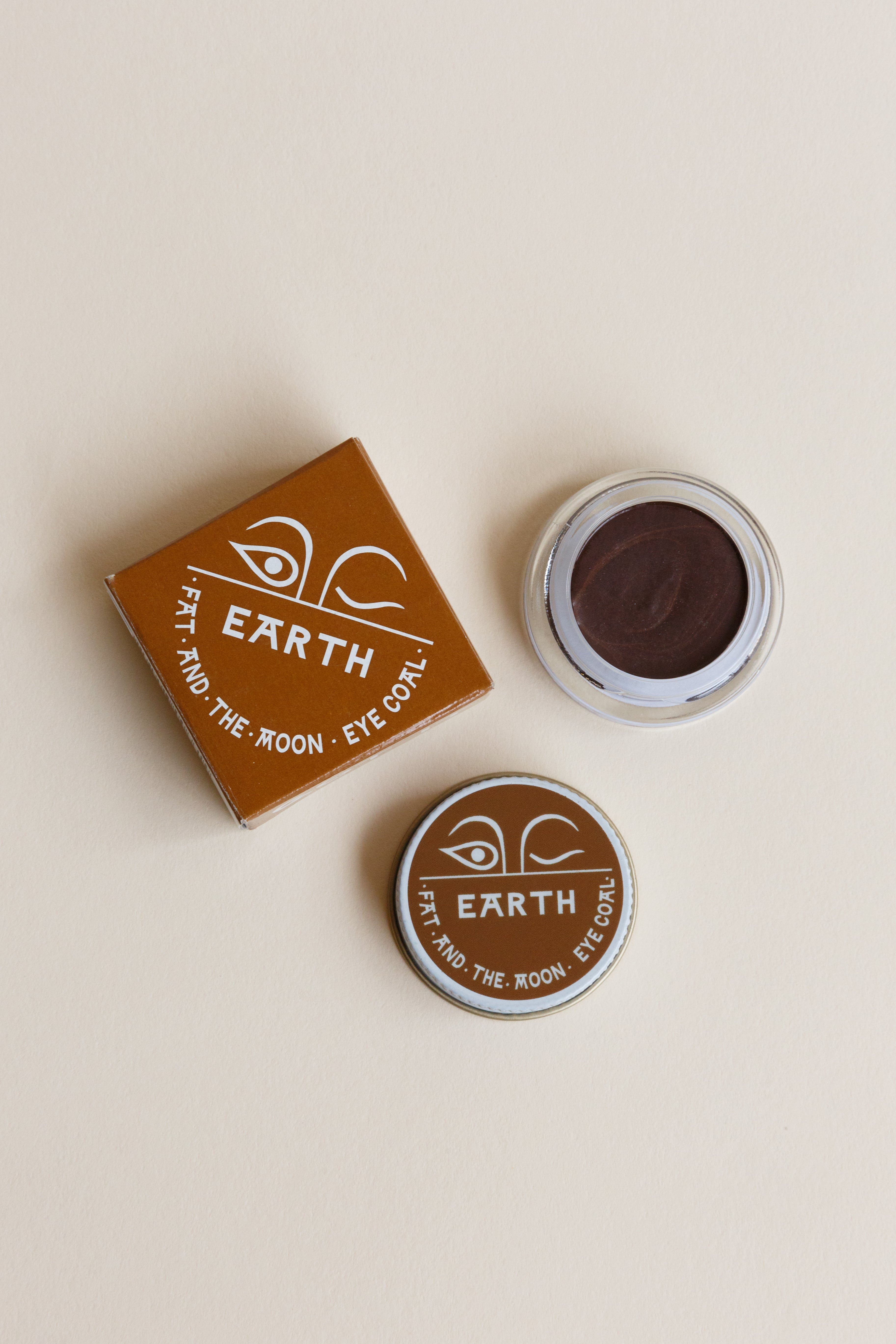 A bar of Earth Fat and the Moon Eye Coal